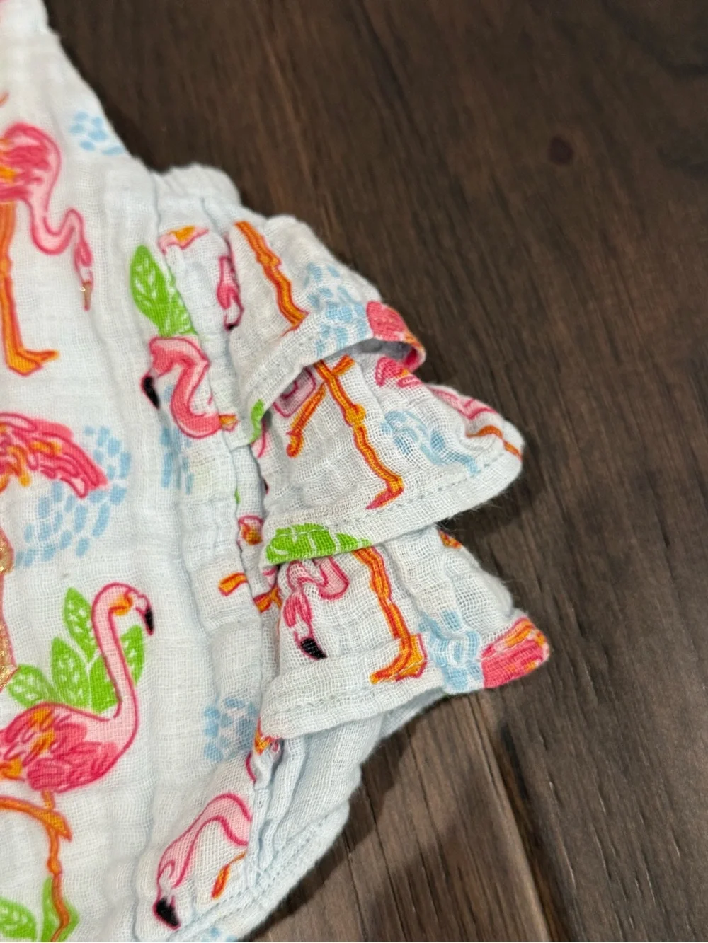 MudPie 6-9 month flamingo ruffle romper with cross cross back
